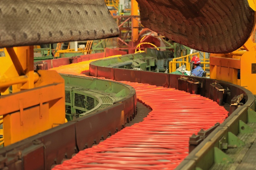 WalsinYantai_StelmorConveyor_web Primetals Technologies erhält FAC für Edelstahl Bar-in-Coil-Auslauflösung von Yantai Walsin. Das Bild zeigten einen kurvenförmigen Fördererabschnitt zur Beschickung des Stelmor-Förderers.