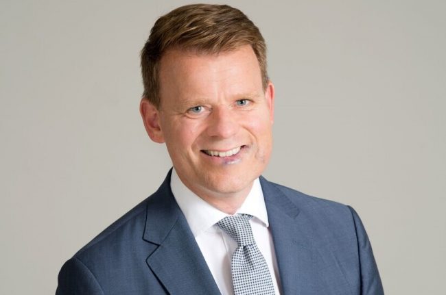 Auf dem Foto ist Axel Hamann zu sehen.